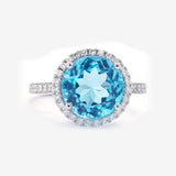 14KW Blue Topaz and Natural Diamond (1/4 ctw) Ring