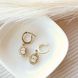 Vintage Inspired Halo Oval Diamond Dangle Earrings
