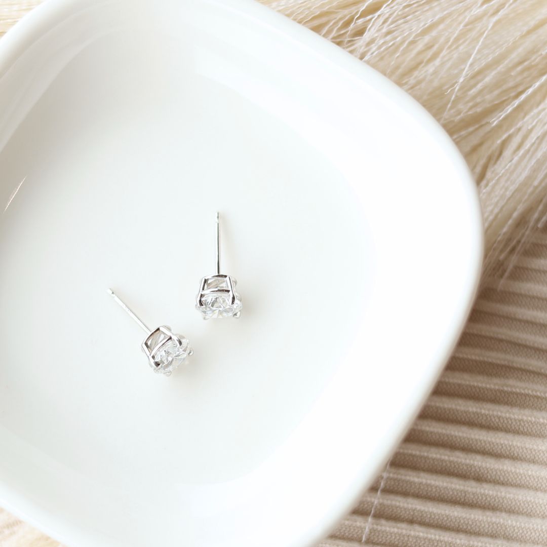 .50 Carat TW Round Diamond Solitaire Earrings