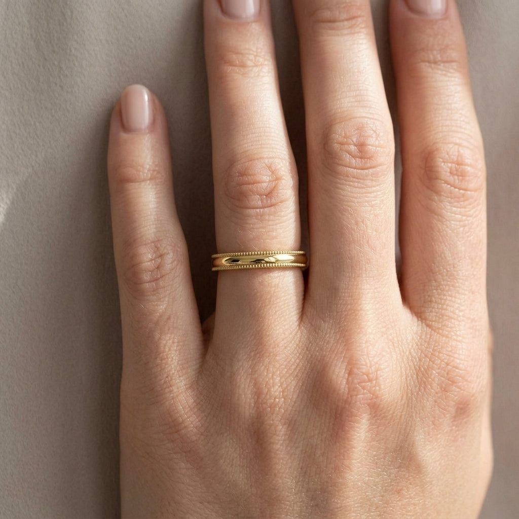 Milgrain Half Round Band — Comfort fit · 2.5 mm, yellow gold, on the hand