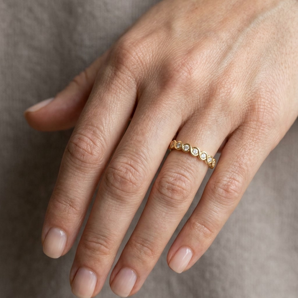 Opal — Round · 1.5 mm · 1/6 ctw, yellow gold, on the hand