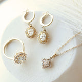 Vintage Inspired Halo Oval Diamond Ring