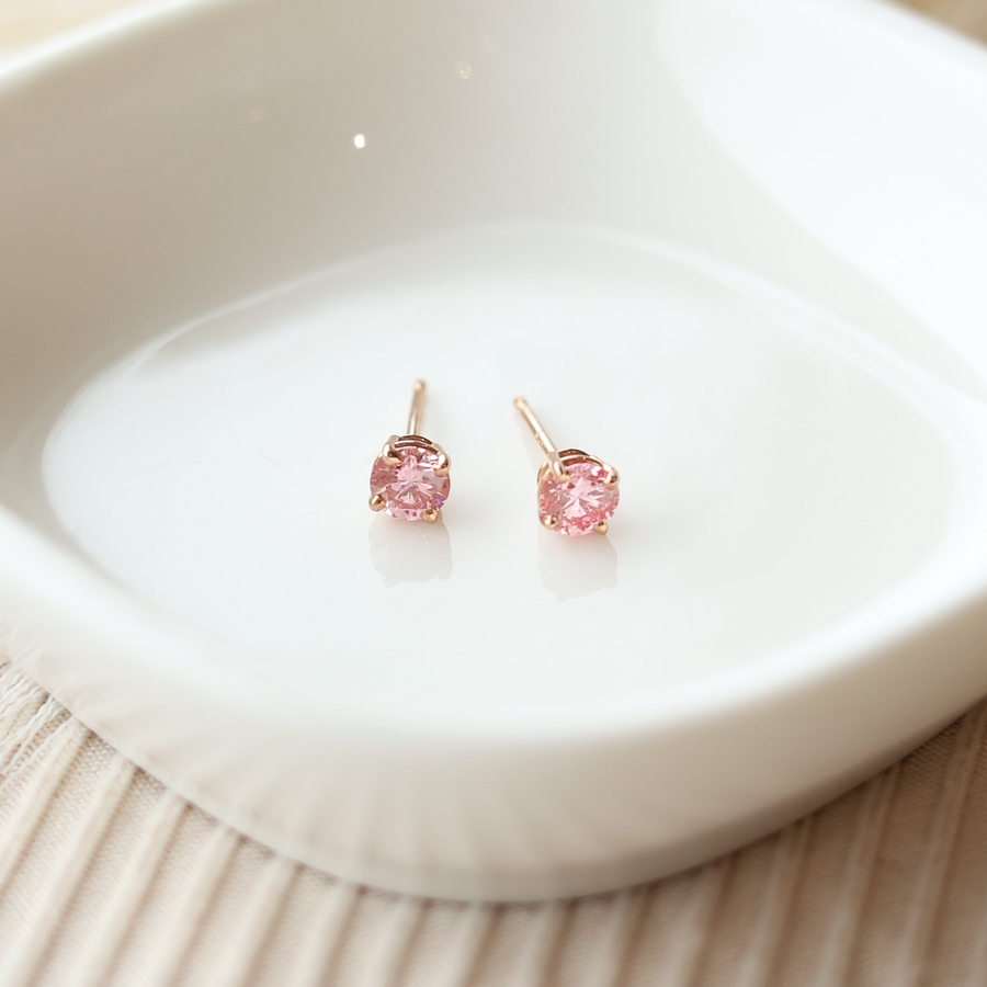 Round Pink Diamond Solitaire Earrings (0.50 Carat TW)