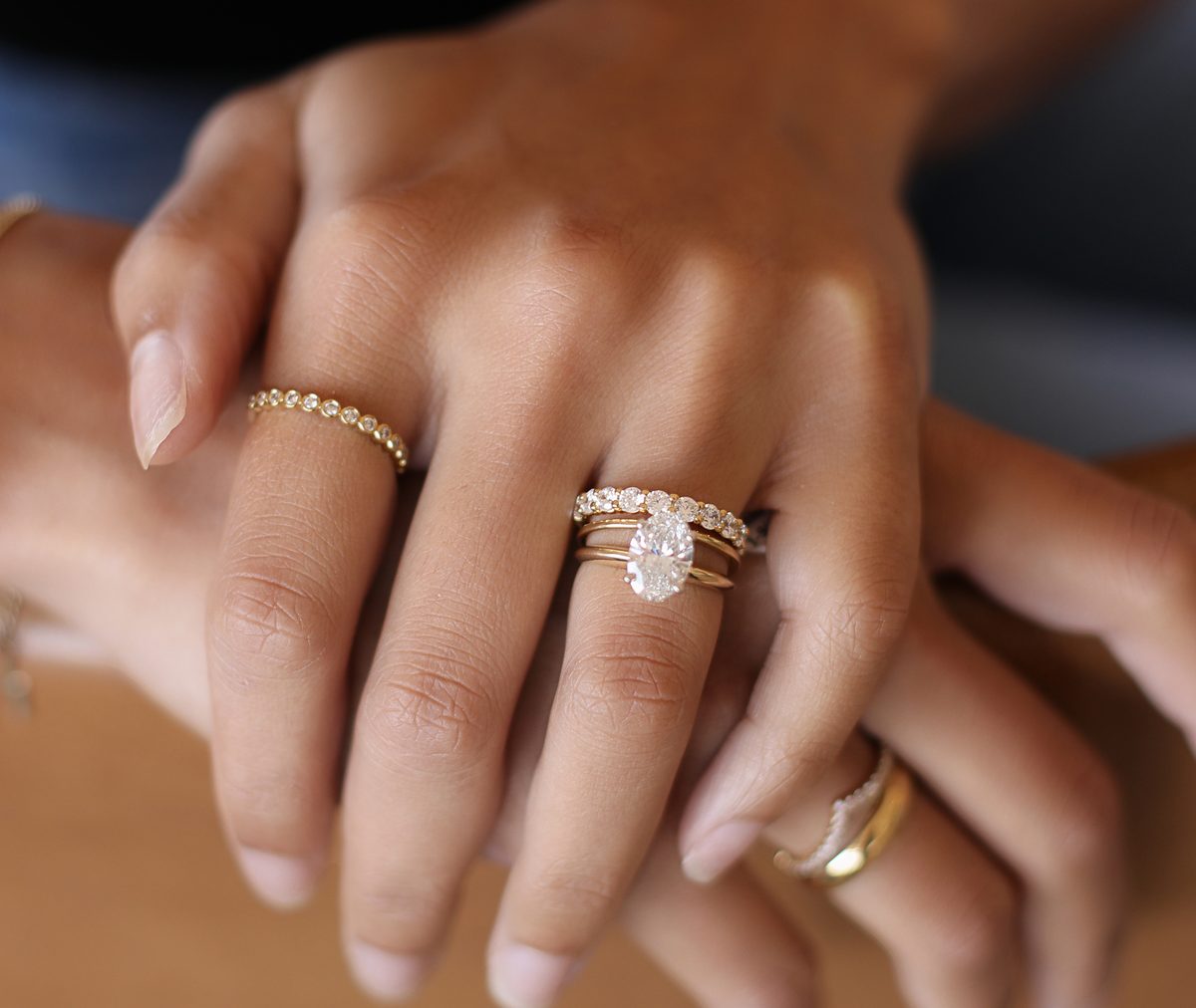 Alloy engagement ring and wedding bands worn together